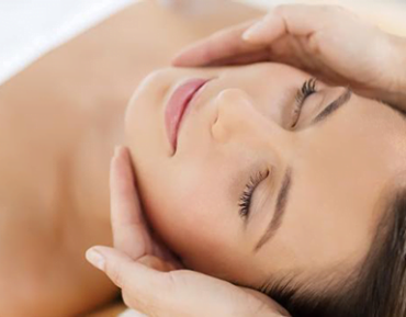 A woman getting a Signature Facial